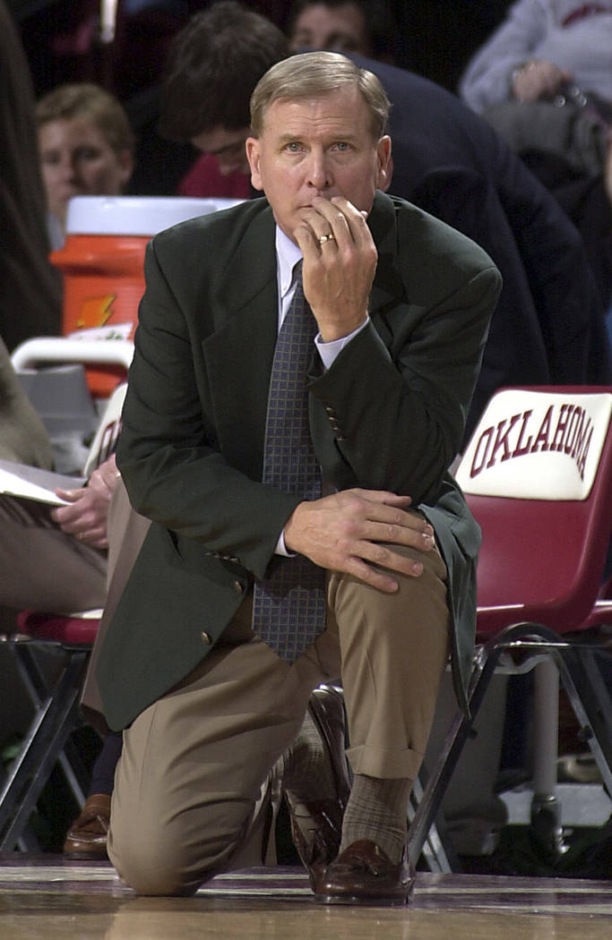 In this Feb. 8, 2003, file photo, former Baylor head coach Dave Bliss watches as his Baylor team gets routed by Oklahoma during a Big 12 Conference game in Norman, Okla. (AP Photo/Jerry Laizure, File)
