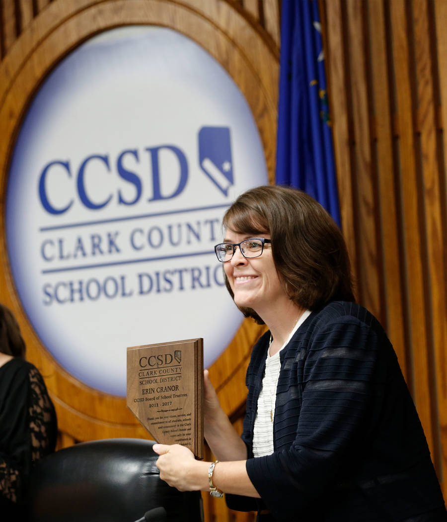 Erin Cranor, a member of the Clark County School Board, District G, receives a plaque during her last meeting as a board member at Edward Greer Education Center in Las Vegas, Thursday, Aug. 10, 20 ...
