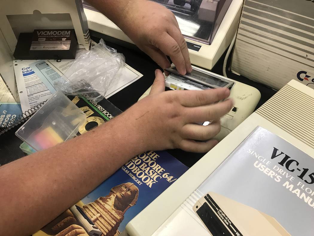 Vincent Mazzei, 15, puts computer game inside of his Commodore VIC-20 on July 29, 2017 at the Commodore Retro Expo at Alexis Park Resort, 375 E. Harmon Ave. (Kailyn Brown/ View) @KailynHype
