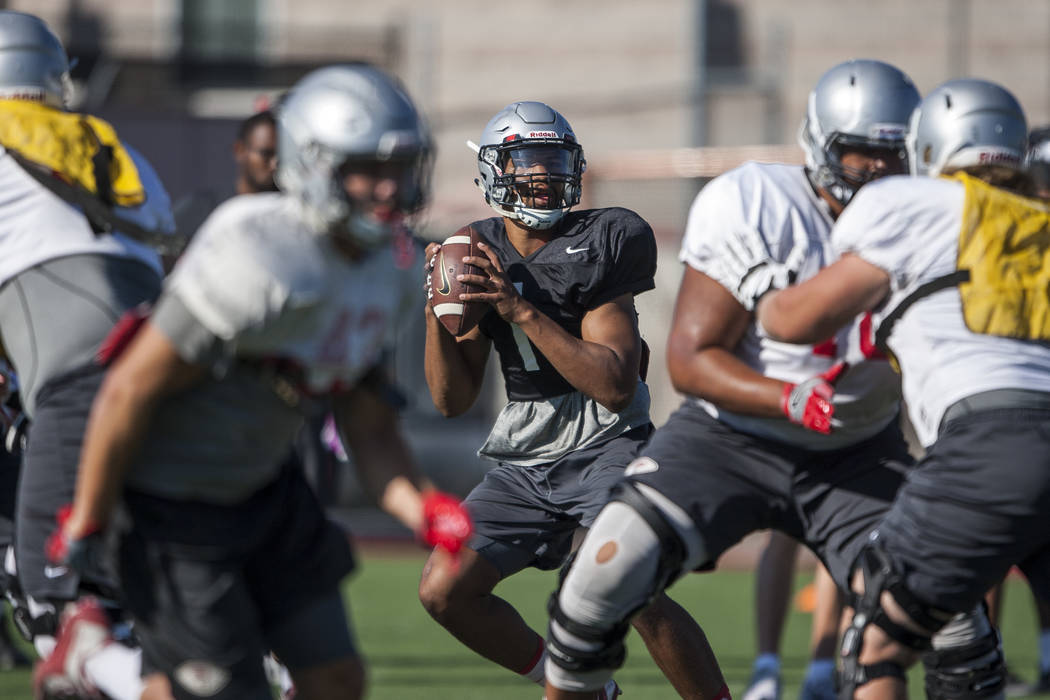 UNLV quarterback Armani Rogers looks to pass during training camp at Rebel Park on Monday, Aug. 14, 2017.  Patrick Connolly Las Vegas Review-Journal @PConnPie