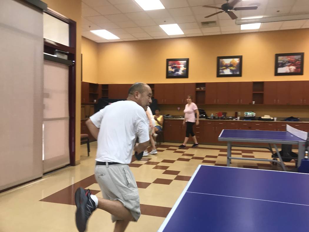 A member hits ping pong ball on July 3, 2017 at Sun City Aliante community center, 7390 N. Aliante Parkway. (Kailyn Brown/ View) @KailynHype