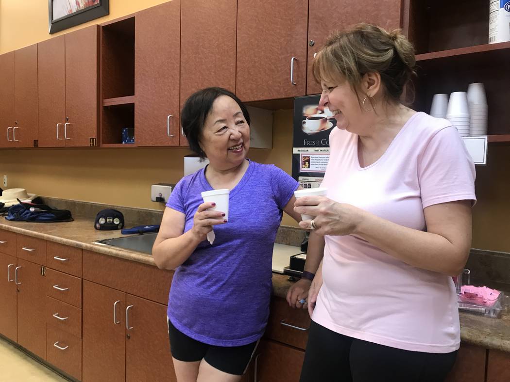 Xiaoli Huang and Susan Long take coffee break during ping pong game on July 3, 2017 at Sun City Aliante community center, 7390 N. Aliante Parkway. (Kailyn Brown/ View) @KailynHype