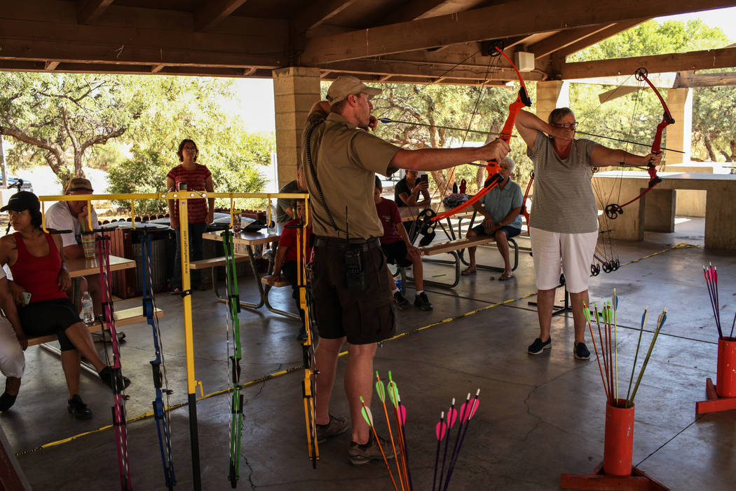 Park Interpreter David Low demonstrates a proper shooting position during an archery target shooting program at Spring Mountain Ranch State Park near Blue Diamond on Aug. 25, 2017. Joel Angel Juar ...