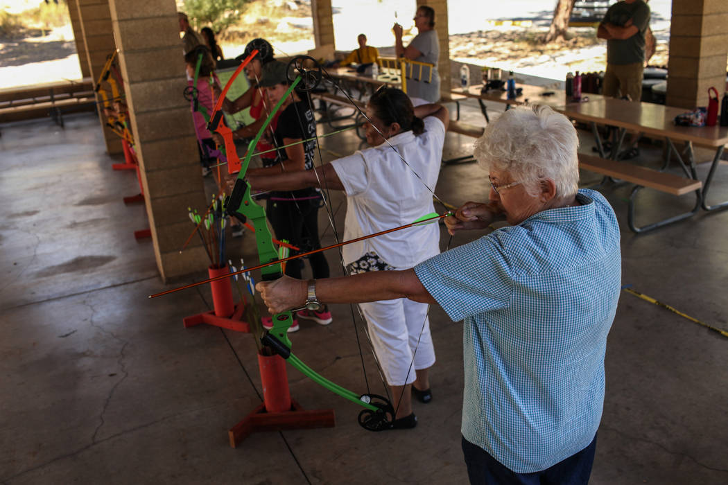 Reena Franze practices during an archery target shooting program at Spring Mountain Ranch State Park near Blue Diamond on Aug. 25, 2017. Joel Angel Juarez Las Vegas Review-Journal @jajuarezphoto