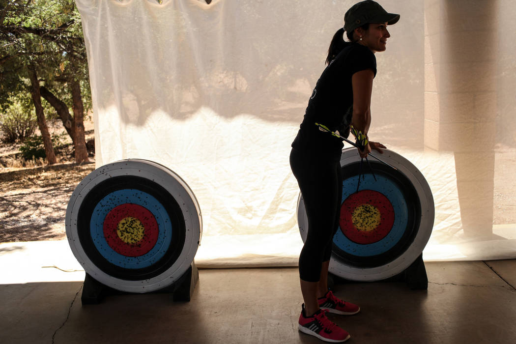 Raquel Adams retrieves arrows during an archery target shooting program at Spring Mountain Ranch State Park near Blue Diamond on Aug. 25, 2017. Joel Angel Juarez Las Vegas Review-Journal @jajuarez ...