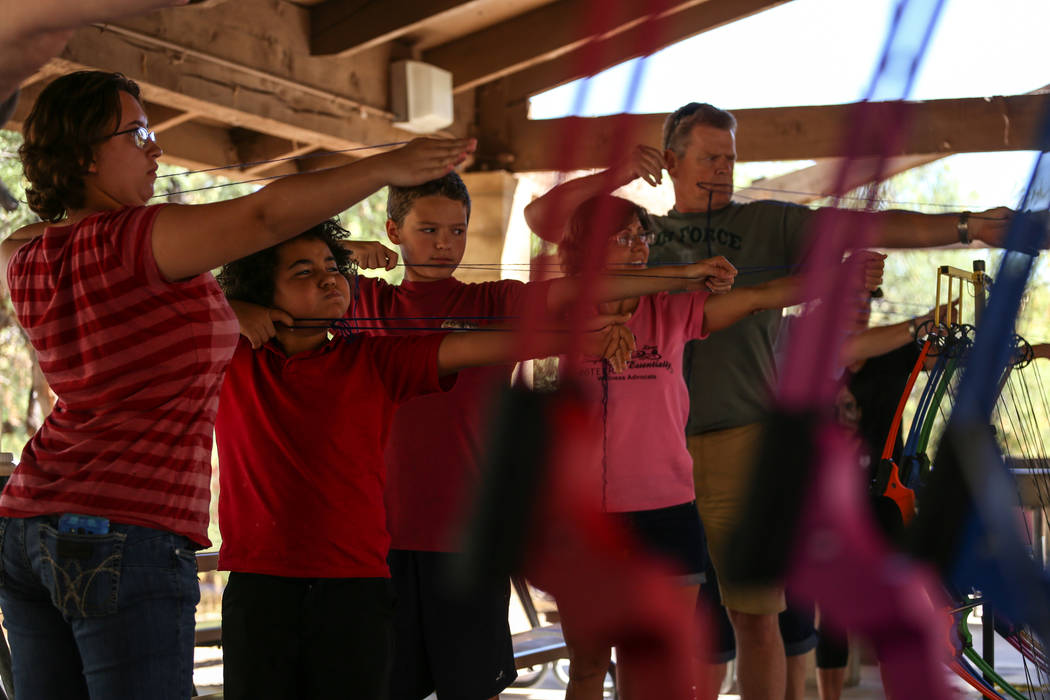 People practice proper shooting arrows during an archery target shooting program at Spring Mountain Ranch State Park near Blue Diamond on Aug. 25, 2017. Joel Angel Juarez Las Vegas Review-Journal ...