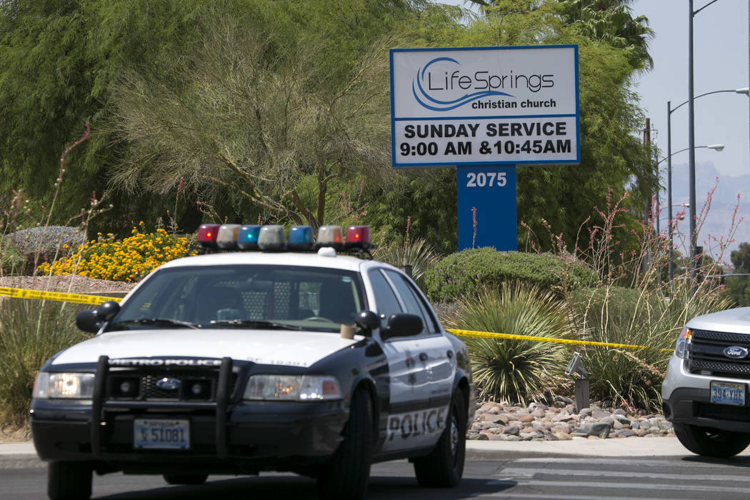 Police cordon off the scene of an officer involved shooting at the Life Springs Christian Church on East Warm Springs Road and Burnham Avenue, Saturday, August 5, 2017, in Las Vegas. Richard Brian ...