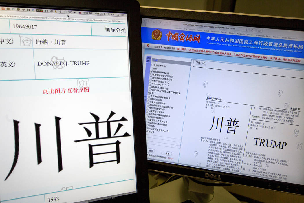Some of the Trump trademarks approved by the Chinese government are displayed on the trademark office's website in Beijing on March 8, 2017. A Trump Organization company applied for four new trade ...