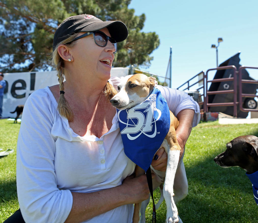Sherrill Willmes holds one of her Italian Greyhounds during Bark in the Park, a tradition to bring your dogs to the game,  at Cashman Field in Las Vegas, Sunday, April 30, 2017. Elizabeth Brumley  ...