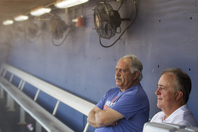 Las Vegas 51s manager Wally Backman, left, and president Don Logan sit at the team dugout before the start of the last home game of the season on Saturday, Aug. 27, 2016, in Las Vegas. (Erik Verdu ...
