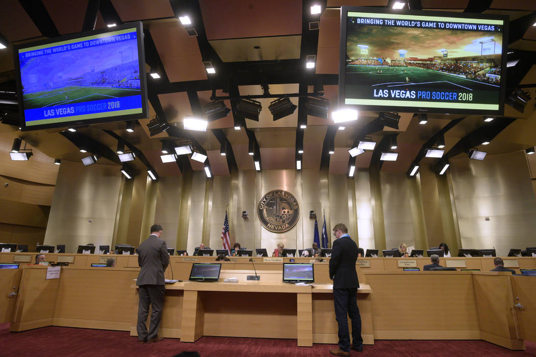 City of Las Vegas Director of Economic and Urban Development Bill Arent, left, and Las Vegas Soccer LLC founder and president Brett Lashbrook make a presentation during a meeting of the Las Vegas  ...