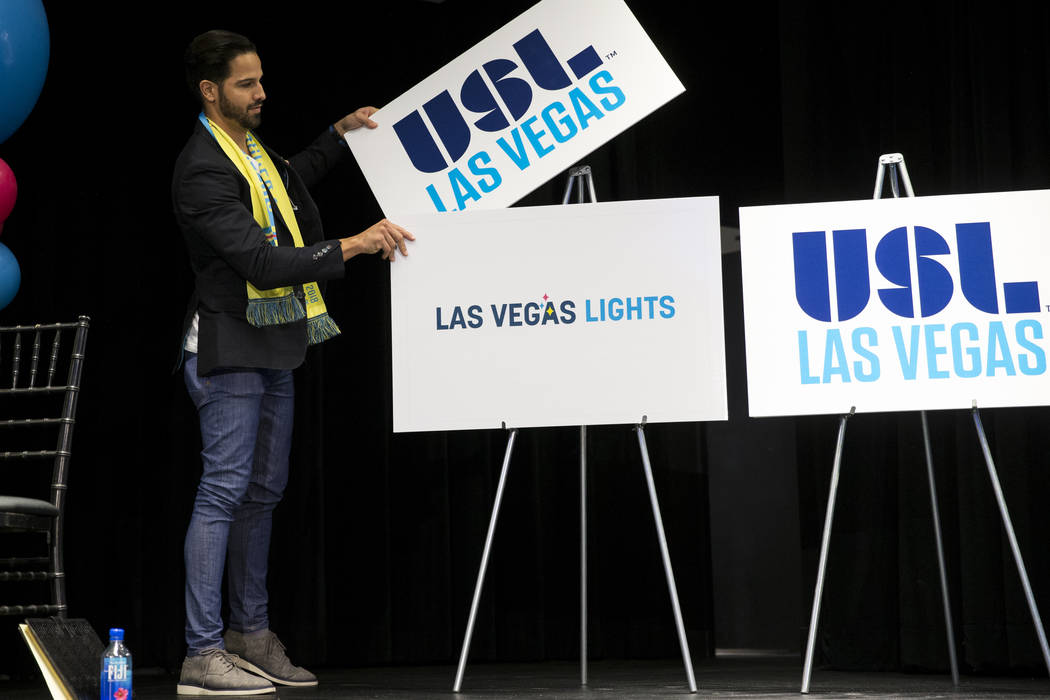 Ricardo Laguna, professional BMX rider and television personality, reveals one of six possible names for the future United Soccer League Las Vegas soccer team during an event at the Zappos campus ...