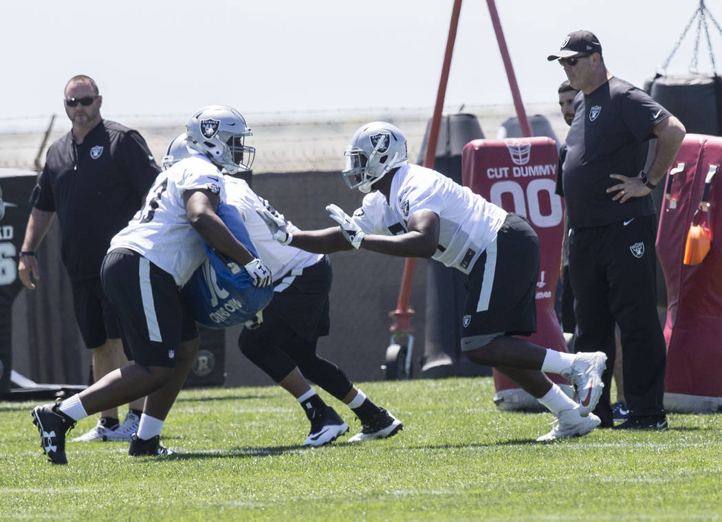 Raiders fourth-round draft pick David Sharpe, second from right, works through offensive lineman drills during rookie minicamp on Friday, May 5, 2017, at Oakland Raiders Headquarters, in Alameda,  ...