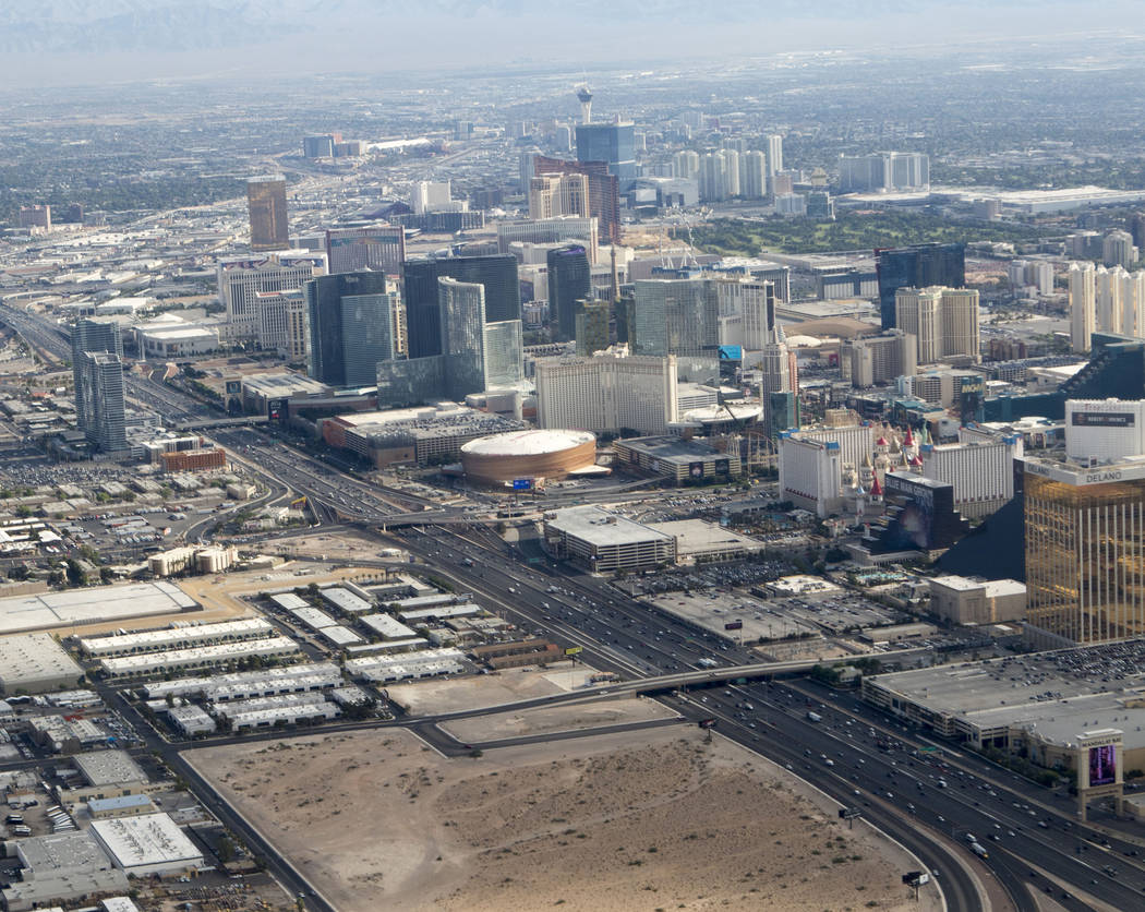 An aerial view of the Raiders stadium site in Las Vegas, lower left, on Wednesday, July 26. Heidi Fang Las Vegas Review-Journal @HeidiFang