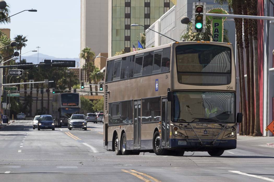 A Regional Transportation Commission bus turns onto North Las Vegas Boulevard from East Carson Avenue in downtown Las Vegas. (Richard Brian/Las Vegas Review-Journal) @vegasphotograph