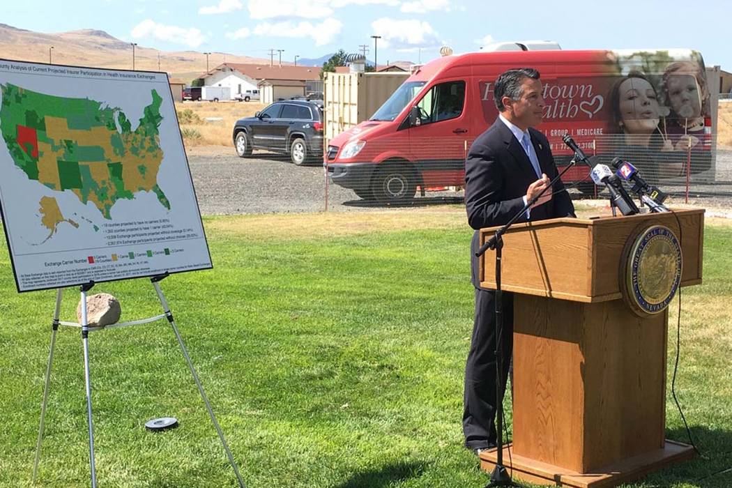 Gov. Brian Sandoval announces an insurance carrier to provide service in 14 rural counties on Nevada’s health insurance exchange at a press conference in Silver Springs on Tuesday, Aug. 15, 2017 ...
