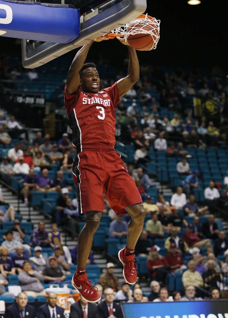 Stanford guard Malcolm Allen dunks against Washington during the second half of an NCAA college basketball game in the first round of the Pac-12 tournament Wednesday, March 9, 2016, in Las Vegas.  ...