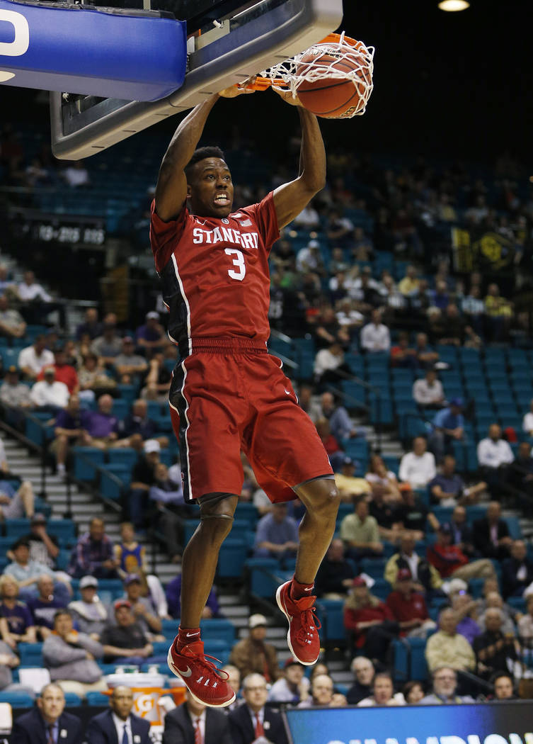 Stanford guard Malcolm Allen dunks against Washington during the second half of an NCAA college basketball game in the first round of the Pac-12 tournament Wednesday, March 9, 2016, in Las Vegas. ...