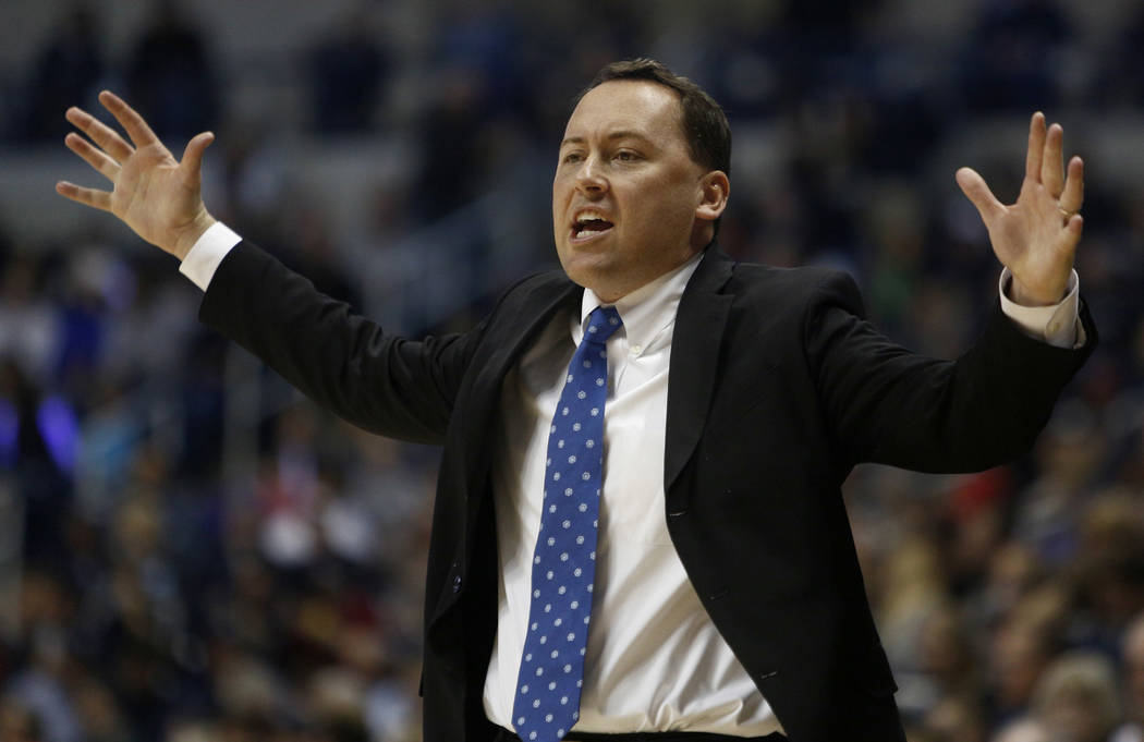 FILE - In this Nov. 14, 2014, file photo, Northern Arizona coach Jack Murphy gestures during his team's NCAA college basketball game against Xavier in Cincinnati. Northern Arizona's 2015-16 season ...