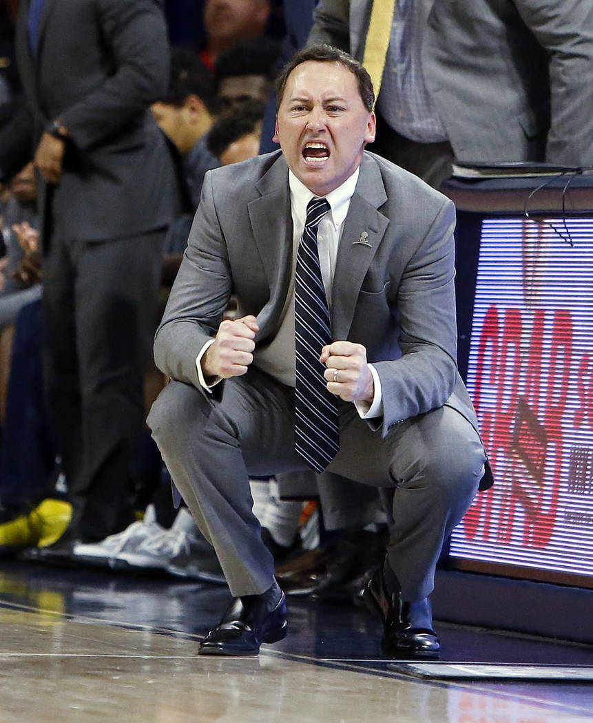 Northern Arizona coach Jack Murphy reacts to a foul call against Arizona during the second half of an NCAA college basketball game Wednesday, Dec. 16, 2015, in Tucson, Ariz. Arizona won 92-37. (AP ...