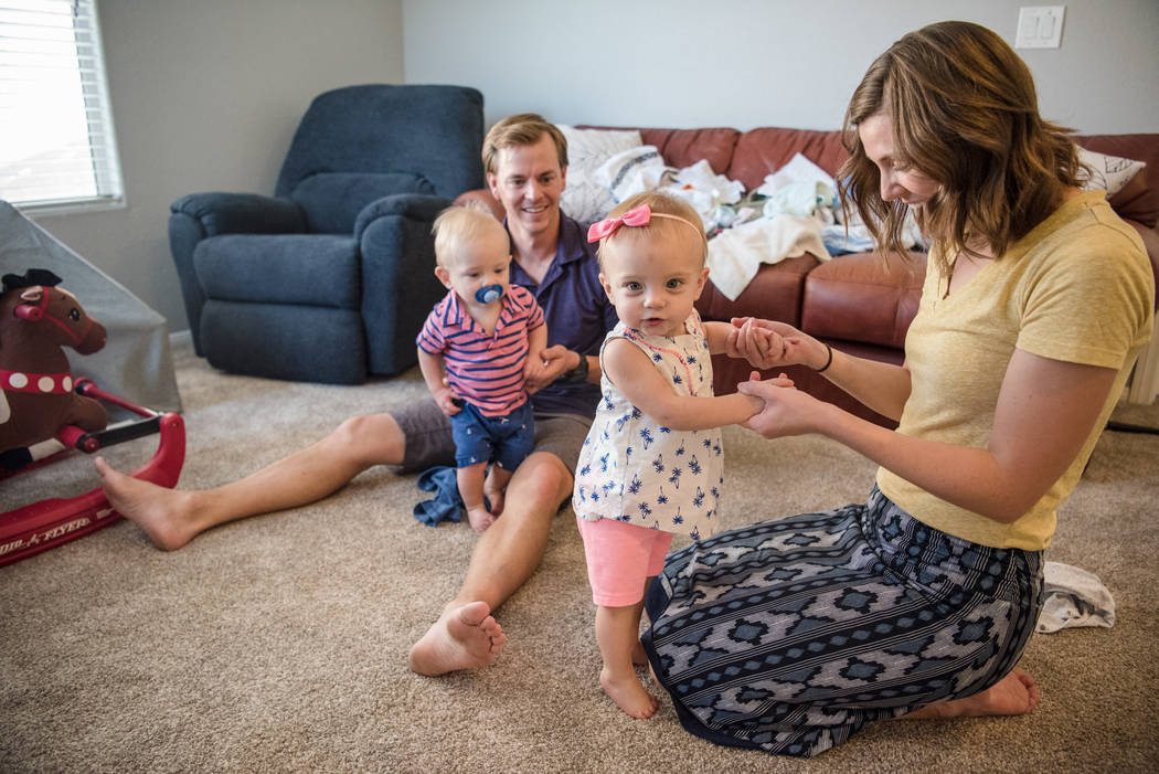 Aaron and Megan Barborka with their twins, Henry and Lorea, in the Barborka home on Tuesday, Aug. 15, 2017, in Las Vegas. (Morgan Lieberman/Las Vegas Review-Journal)