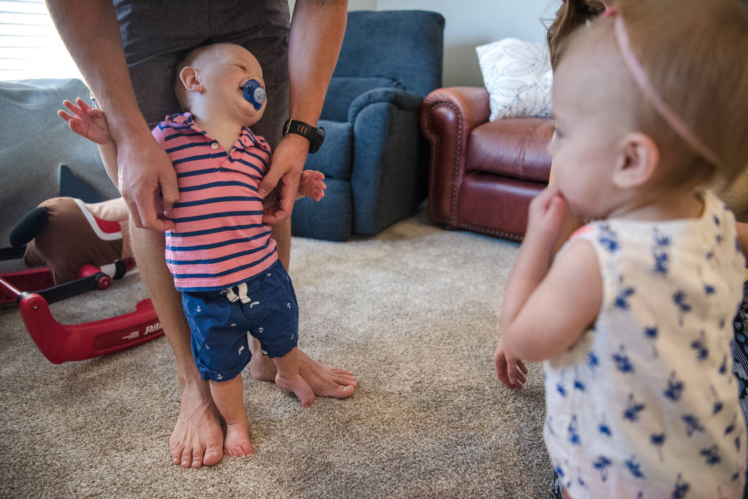 Aaron and Megan Barborka with their twins, Henry and Lorea, in the Barborka home on Tuesday, Aug. 15, 2017, in Las Vegas. (Morgan Lieberman/Las Vegas Review-Journal)