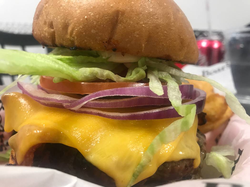 The BBQ bacon burger is served with sidewinder fries on July 11, 2017 at Chip off the Block Deli, 6440 N. Durango Drive. (Kailyn Brown/ View) @KailynHype