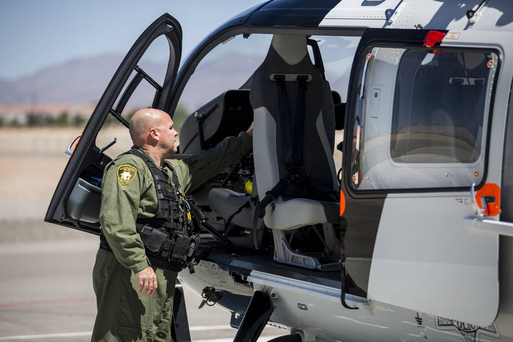 Pilot Bryan Woolard prepares the new Las Vegas Metropolitan Police helicopter for flight at the North Las Vegas Airport on Wednesday, Aug. 16, 2017.  Patrick Connolly Las Vegas Review-Journal @PCo ...