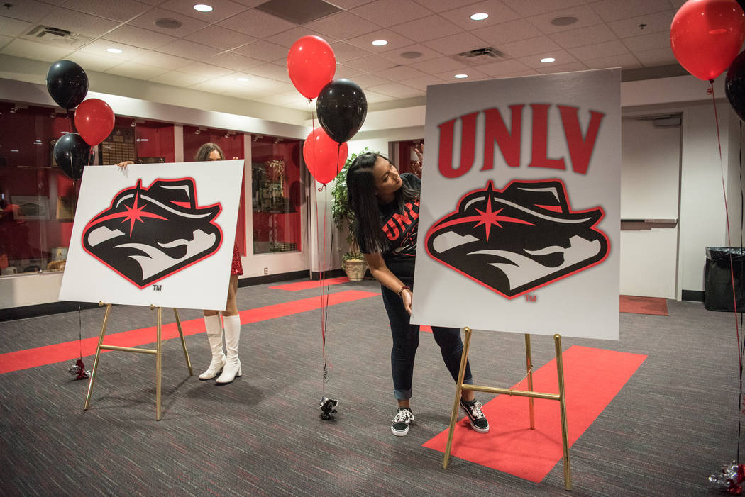 Anne Reyas prepares the new logo for viewing purposes at the UNLV Thomas & Mack Center on Wednesday, June 28, 2017, in Las Vegas. Morgan Lieberman Las Vegas Review-Journal