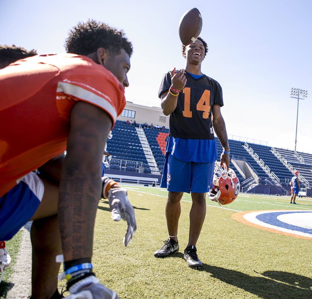 Bishop Gorman quarterback Dorian Thompson Robinson tosses the ball during practice at Fertitta Field at Bishop Gorman High School Monday, Aug. 21, 2017, in Las Vegas. Bridget Bennett Las Vegas Rev ...