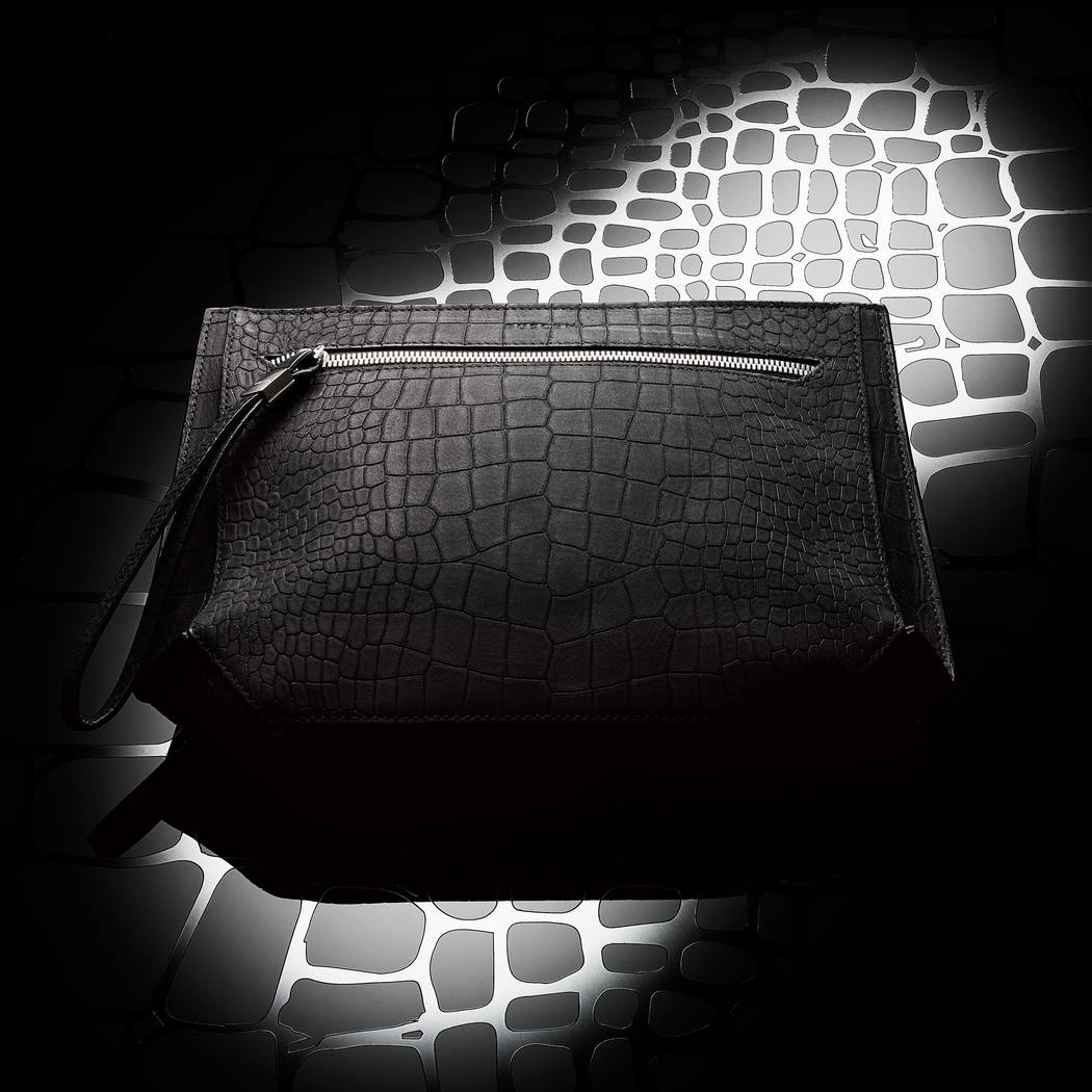 Women's Black Croc Pouch Nubuck with a retail price of $695. (Buscemi)