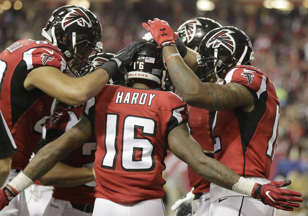 Atlanta Falcons wide receiver Justin Hardy (16) is celebrates after he scored a touchdown against the New Orleans Saints during the first half of an NFL football game, Sunday, Jan. 1, 2017, in Atl ...