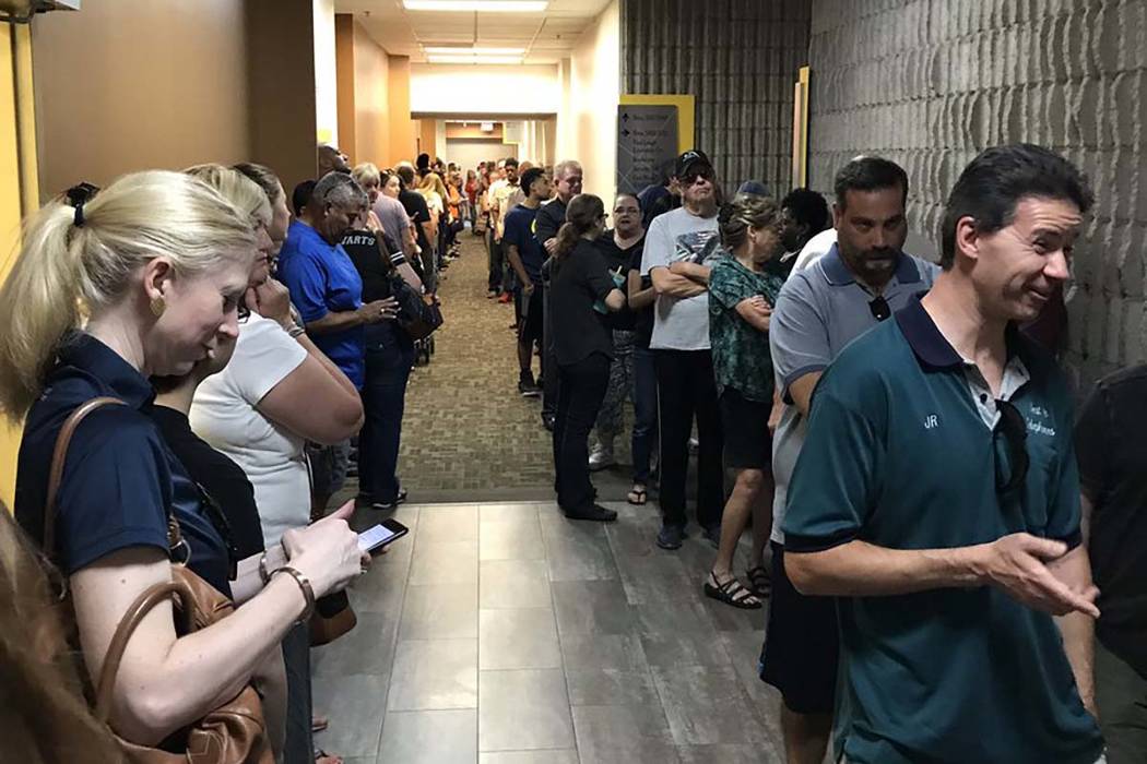 A long line of people wait to buy eclipse glasses at the College of Southern Nevada on Friday, Aug. 18, 2017. (Carri Geer/Las Vegas Review-Journal)