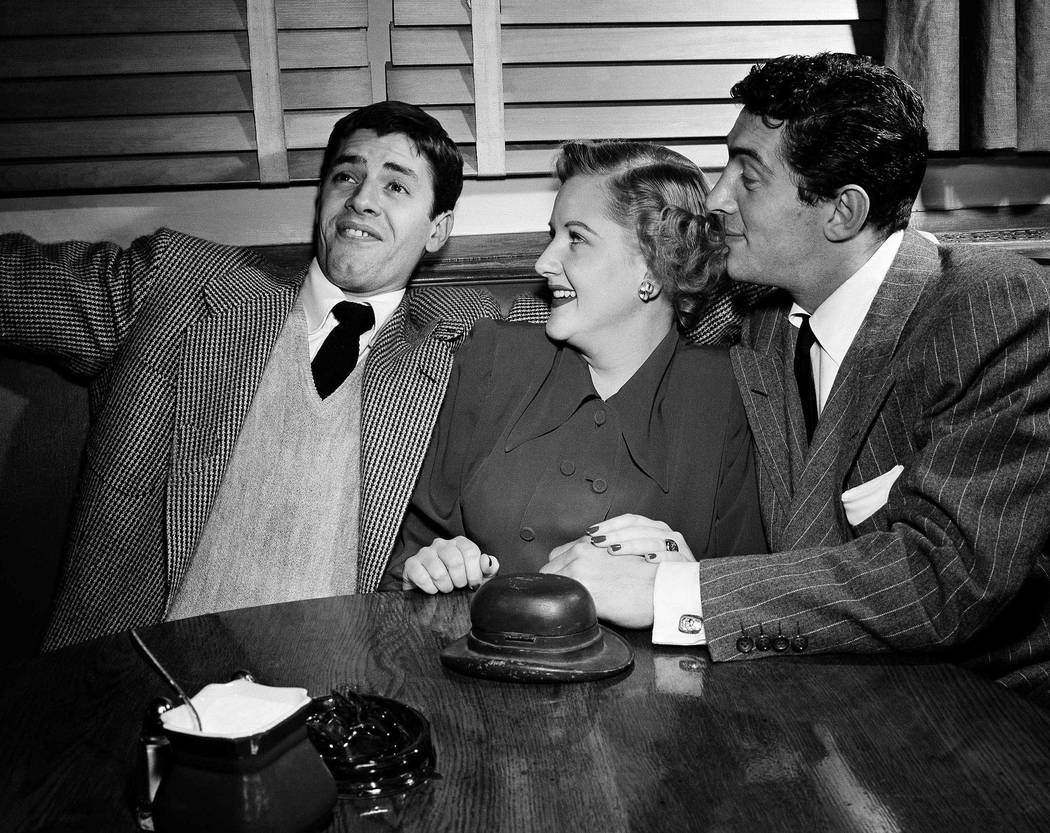 In this Jan. 21, 1949 file photo, big band singer Margaret Whiting is flanked by Jerry Lewis, left, and Dean Martin at the Hollywood Brown Derby on  in Los Angeles. Whiting, the sweet-voiced singe ...