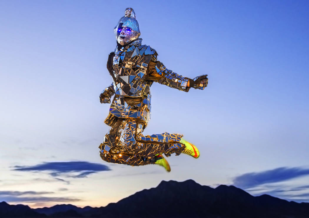 Burner Steve MacWithey, aka "Man in the Mirror," hand made his famous glass suit containing over 5000 mirrored pieces. "The suite allows people to see themselves and the energy they're giving off ...