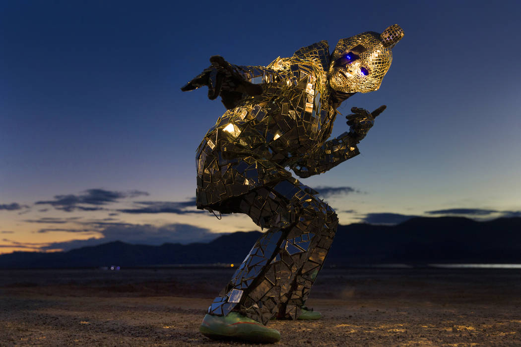 Burner Steve MacWithey, aka "Man in the Mirror," hand made his famous glass suit containing over 5000 mirrored pieces. "The suite allows people to see themselves and the energy they're giving off ...