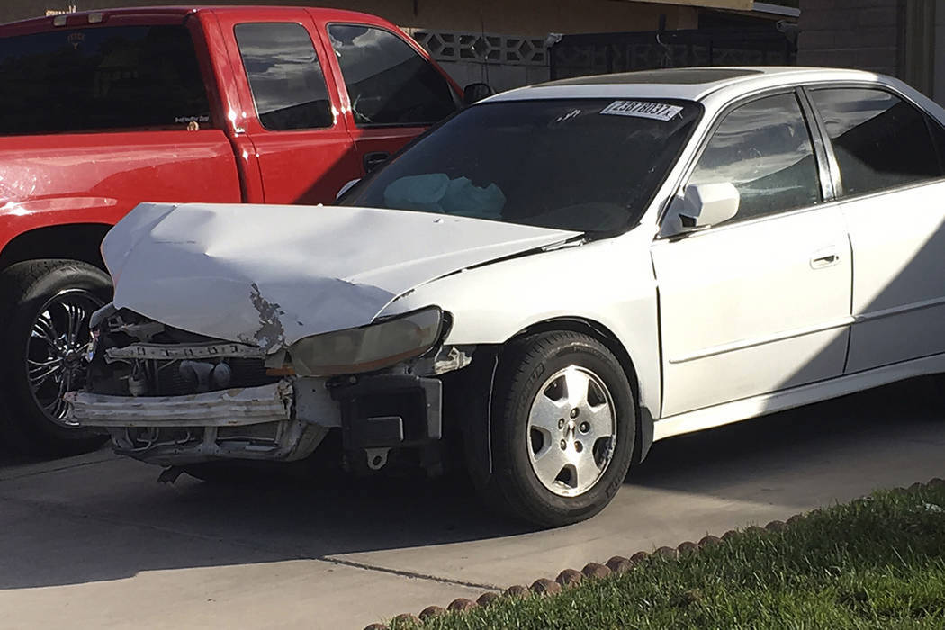 A 2002 Honda Accord involved in a March 3, 2017, crash in which an exploding Takata air bag inflator badly injured the driver, Karina Dorado, sits in a driveway in Las Vegas on Tuesday, April 18,  ...