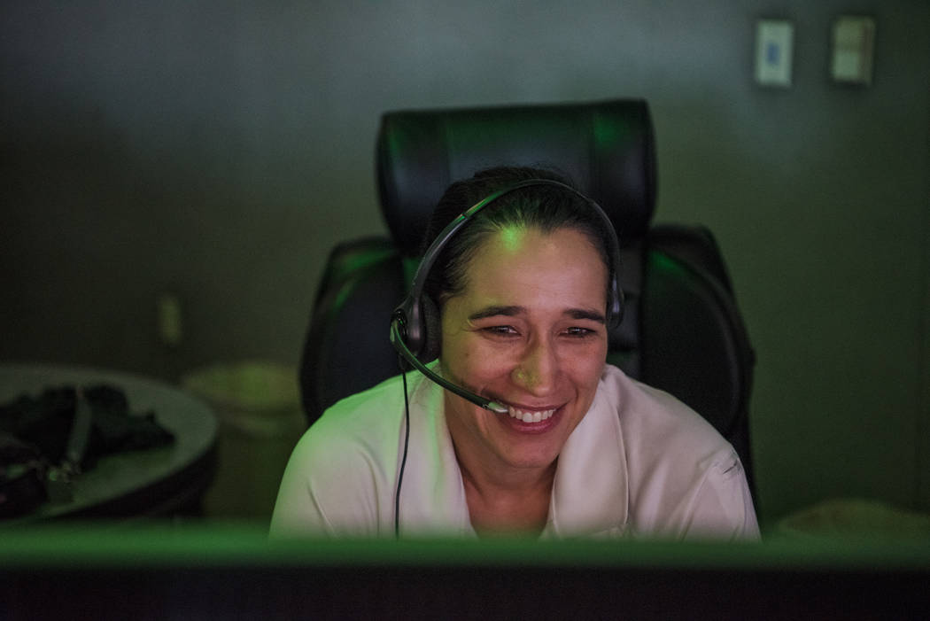 Guinevere Cisne working at the nurse dispatcher station at Las Vegas Fire and Rescue on Friday, Aug. 25, 2017, in Las Vegas. Morgan Lieberman Las Vegas Review-Journal