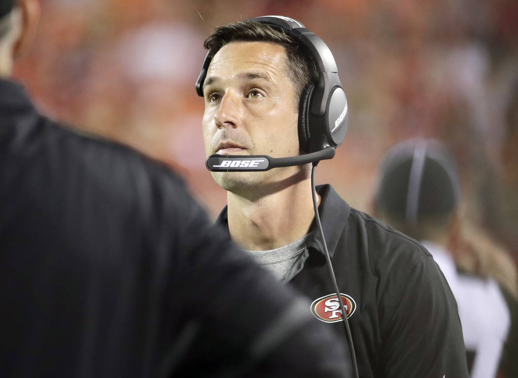 San Francisco 49ers coach Kyle Shanahan looks at the scoreboard during the first half of the team's NFL preseason football game against the Kansas City Chiefs in Kansas City, Mo., Friday, Aug. 11, ...