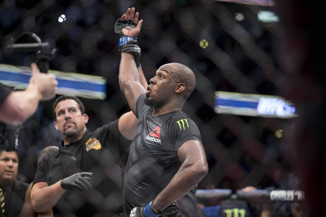 Jon Jones is announced the winner against Daniel Cormier in the light heavyweight title bout during UFC 214 at the Honda Center in Anaheim, Calif., on Saturday, July 29, 2017. Jones won by knockou ...