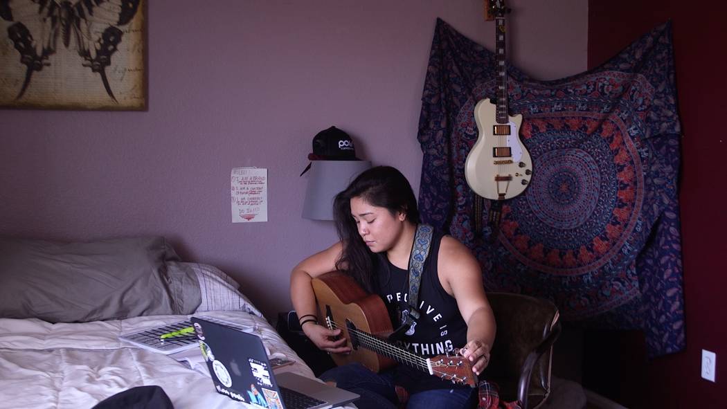 Jessica Manalo plays her guitar (Rachel Aston/Las Vegas Review-Journal)