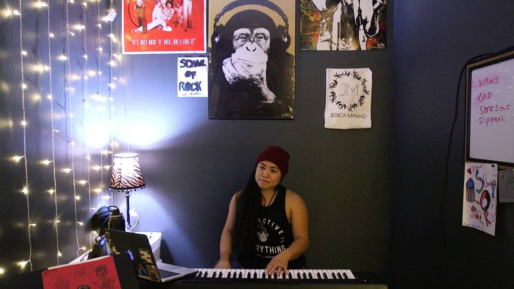 Jessica Manalo plays her guitar (Rachel Aston/Las Vegas Review-Journal)