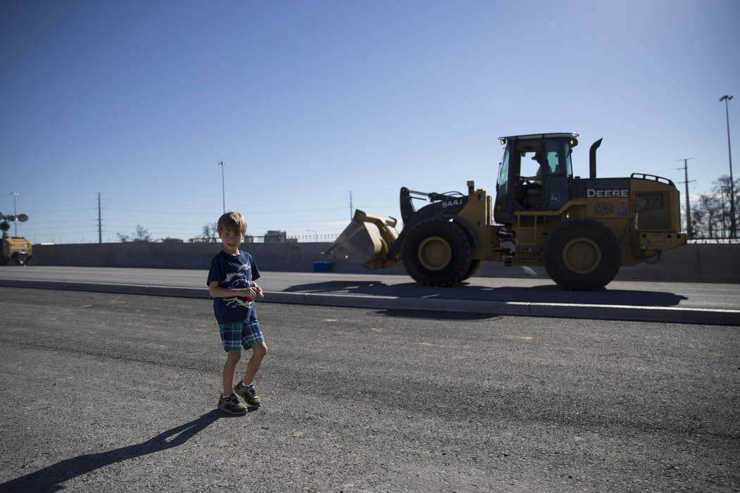 Zacharias Karanikolas, 5, walks a portion of the new Martin Luther King Boulevard, which is being built as part of Project Neon, in Las Vegas, on Saturday, Aug. 26, 2017. Erik Verduzco Las Vegas R ...