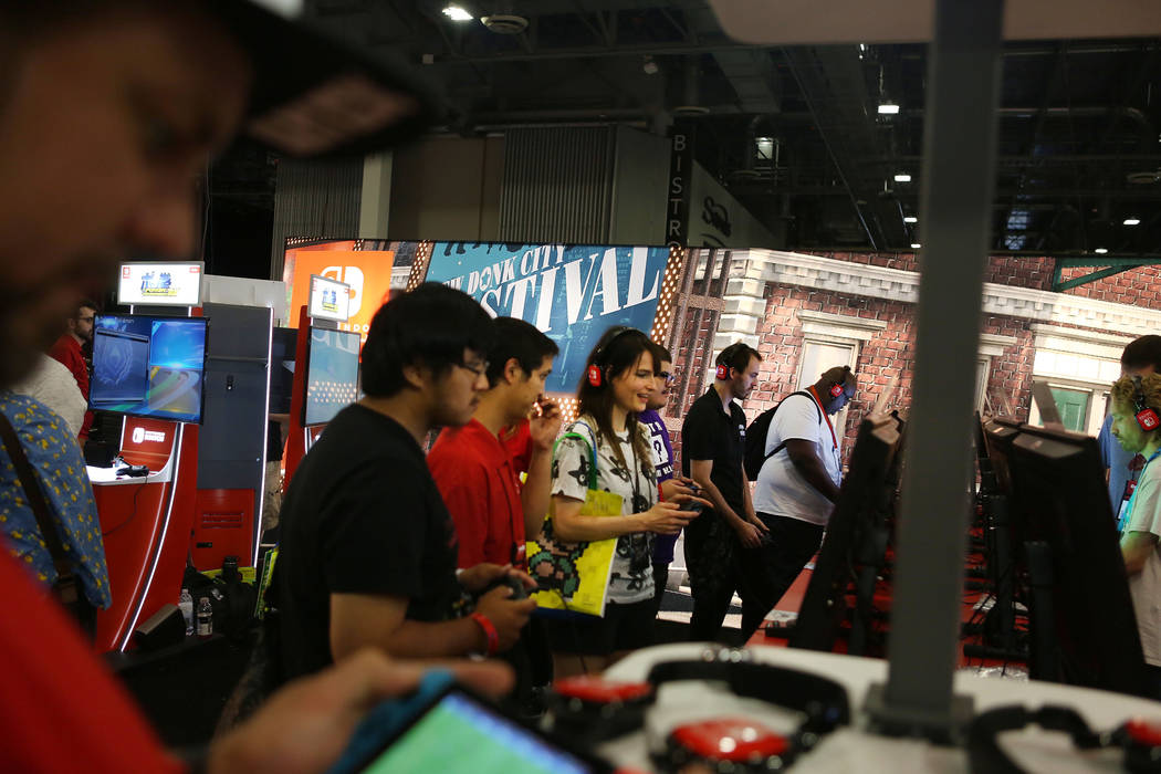 Attendees try the games during the 2017 GameStop Expo at the Sands Expo and Convention Center, Sunday, Aug. 27, 2017 . Elizabeth Brumley Las Vegas Review-Journal