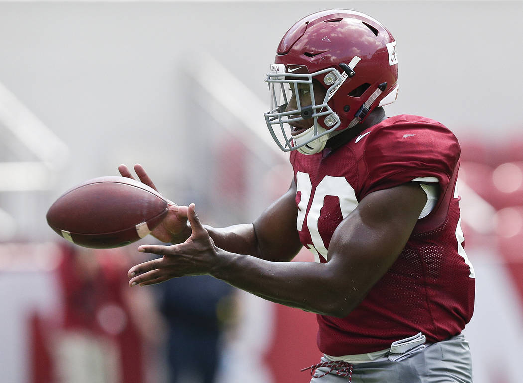 FILE - In this Saturday, Aug. 5, 2017, file photo, Alabama linebacker Shaun Dion Hamilton catches the ball during an NCAA college football practice at Bryant–Denny Stadium in Tuscaloosa, Al ...
