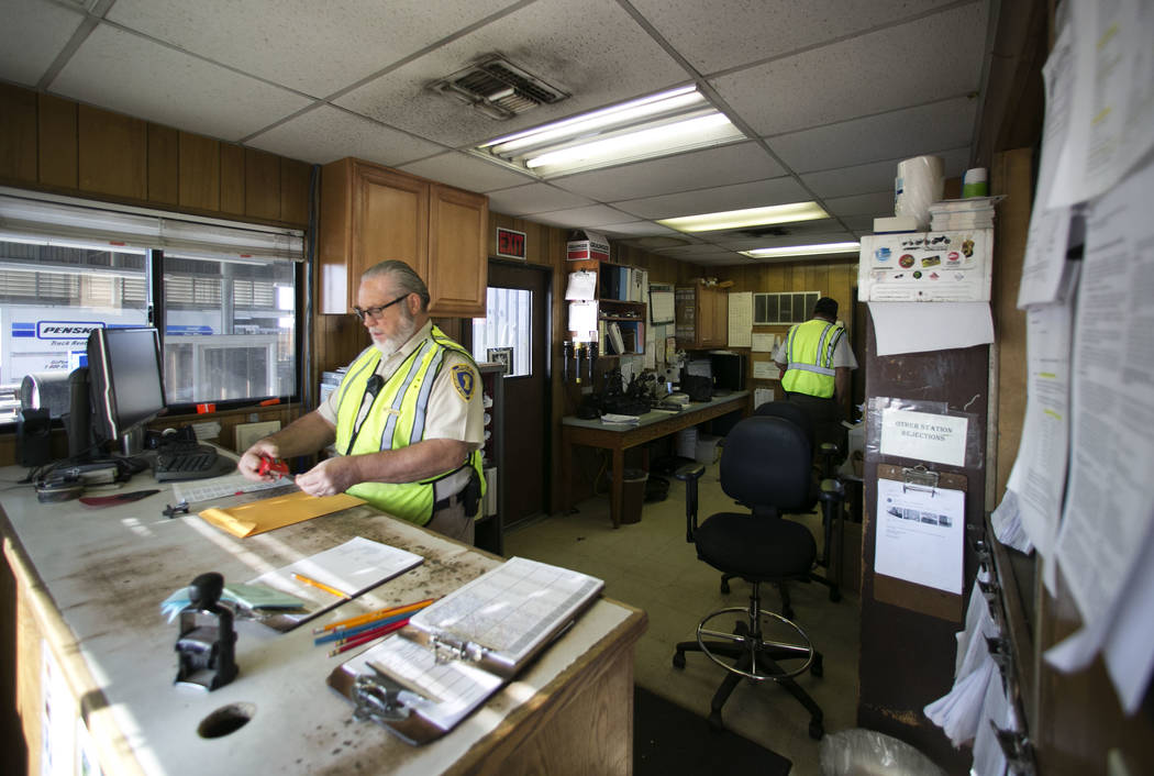 Walt Shinen, left, and Elliott Morris, both supervisors, work inside the office of the California agricultural inspection station Friday, Aug. 25, 2017, on Interstate 15 in Yermo. (Bizuayehu Tesfa ...