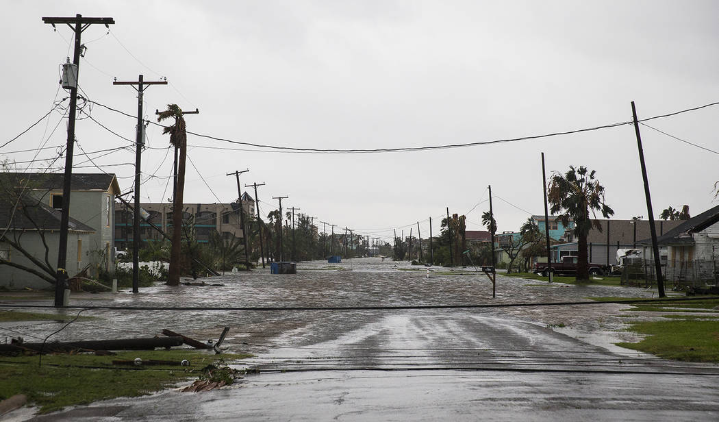 A road remains flooded after Hurricane Harvey ripped through Rockport, Texas, onSaturday, Aug. 26, 2017.  The fiercest hurricane to hit the U.S. in more than a decade spun across hundreds of miles ...