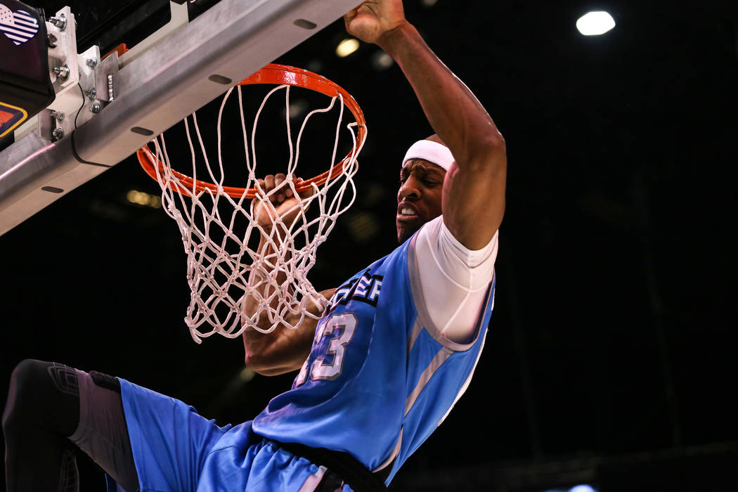 Power's Jerome Williams (13) scores a slam dunk during the second half of the runner-up game of the Big 3 Championship at the MGM Grand Garden Arena in Las Vegas on Aug. 26, 2017. The Ghost Baller ...
