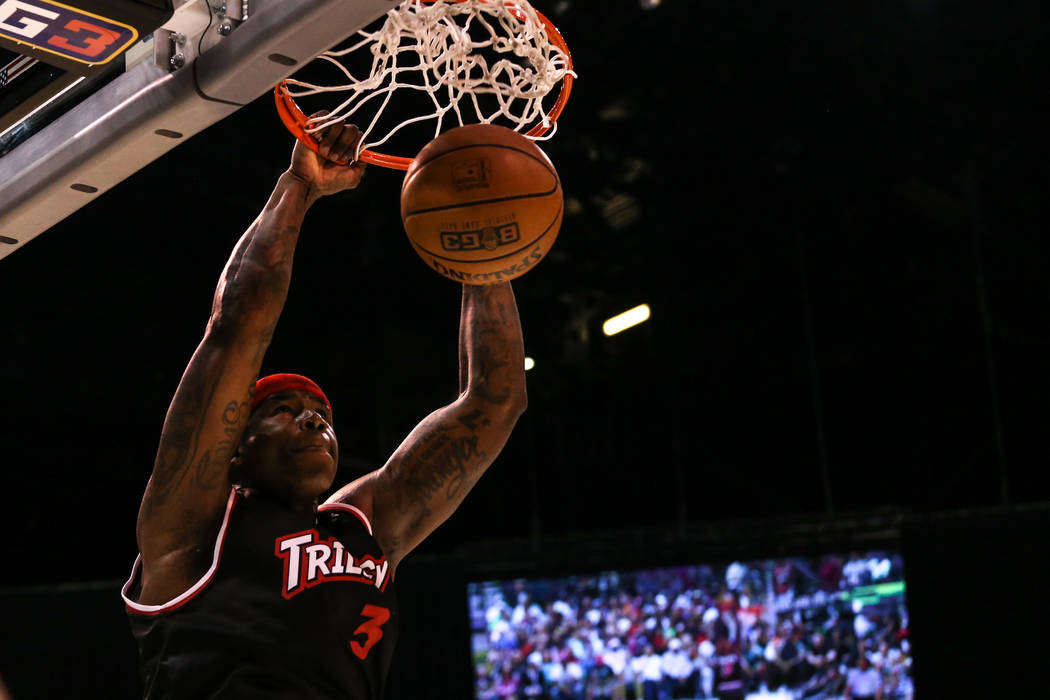 Trilogy's Al Harrington (3) scores a slam dunk during the first half of the Big 3 Championship match at the MGM Grand Garden Arena in Las Vegas on Aug. 26, 2017. Trilogy defeated the 3 Headed Mons ...