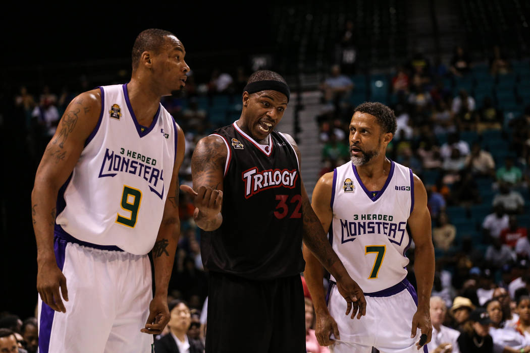 Trilogy's Rashad McCants (32) argues with 3 Headed Monsters' ՠRashad Lewis (9) and Mahmoud Abdul-Rauf (7) after a foul during the second half of the Big 3 Championship match at the MGM Grand Gard ...